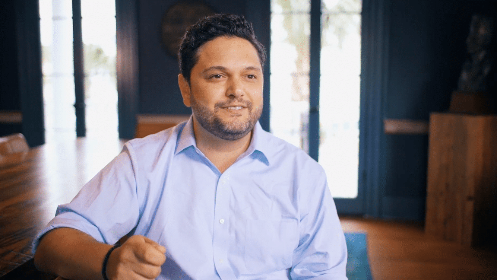 Video still of Managing Partner, Phil Vangelakos being interviewed.